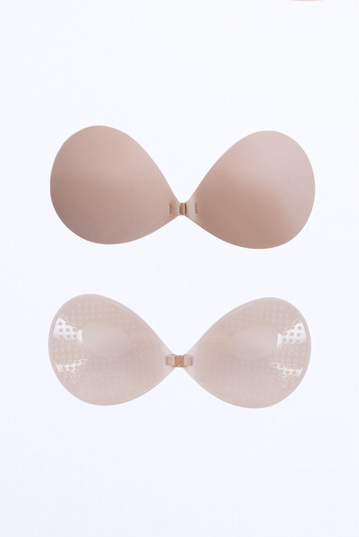 Go strapless with confidence! LayBareShop's stick-on bra offers lift, coverage & comfort under backless, strapless, or plunge outfits. Invisible, breathable & secure.
