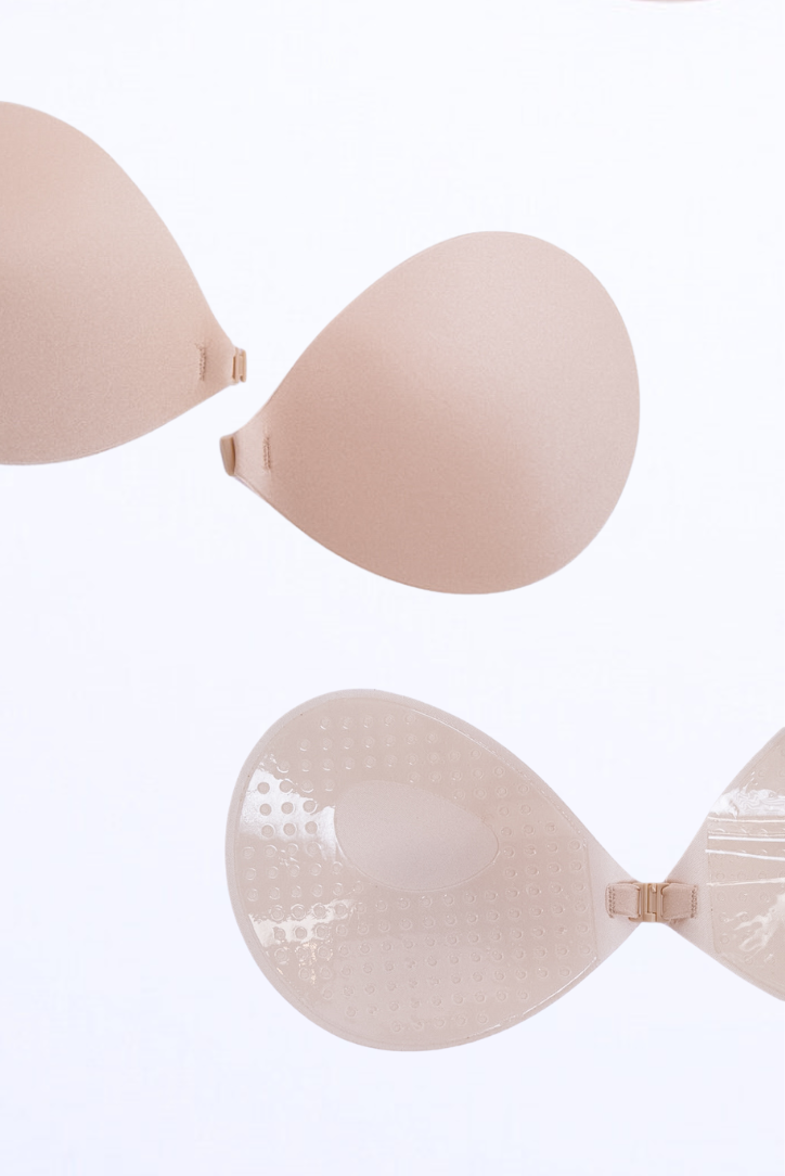 Go strapless with confidence! LayBareShop's stick-on bra offers lift, coverage & comfort under backless, strapless, or plunge outfits. Invisible, breathable & secure.