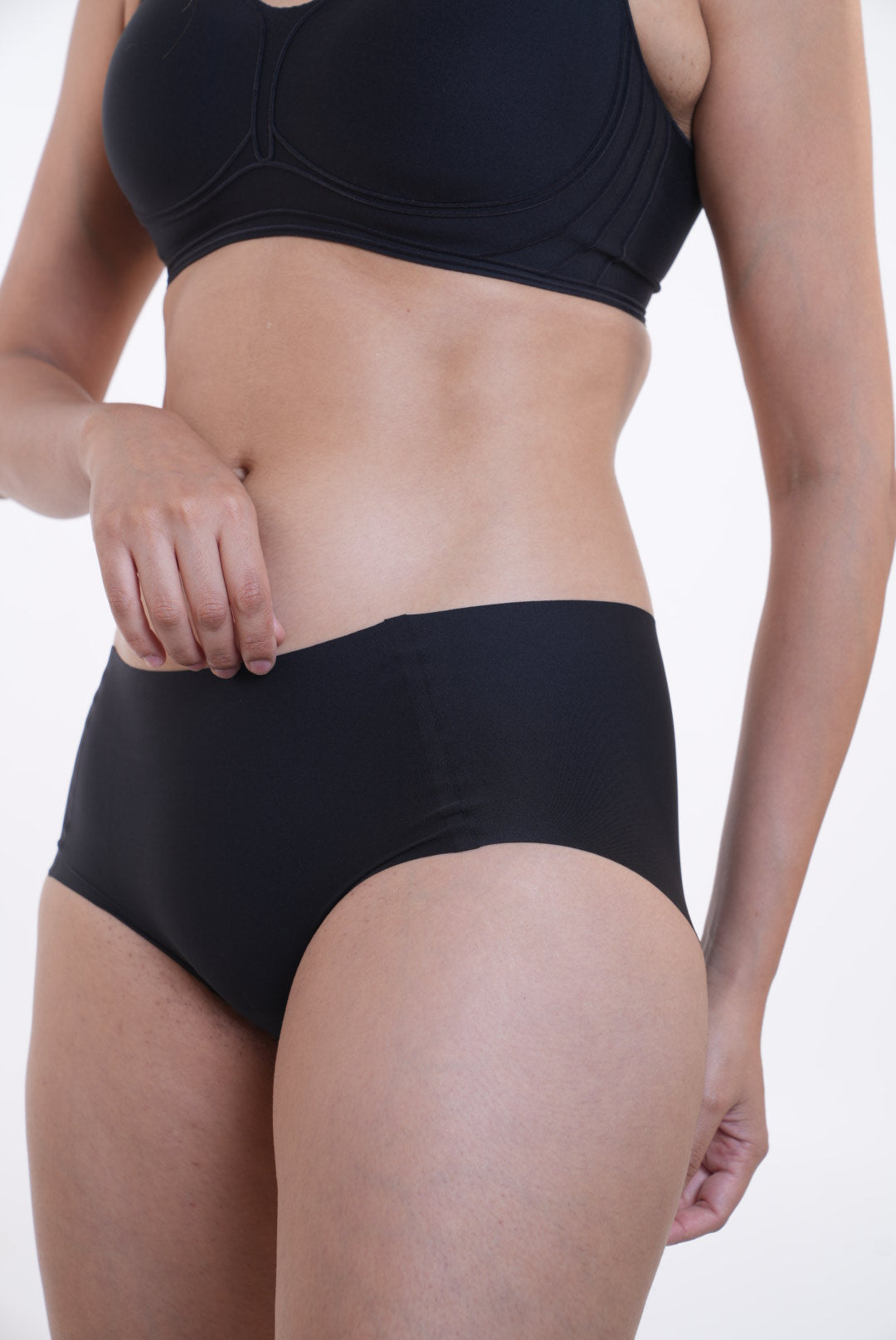 Your go to essential: LayBareShop's BareFit mid-waist panty with soft stretch fabric, cotton gusset, gentle shaping and no visible lines—designed for daily comfort.