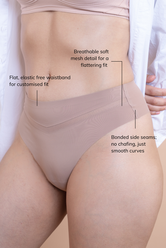 Not your average thong— LayBareShop amoura mesh thong is seam-free, breathable, and sculpting with mesh details and a mid-waist fit for chic comfort that moves with you every day.