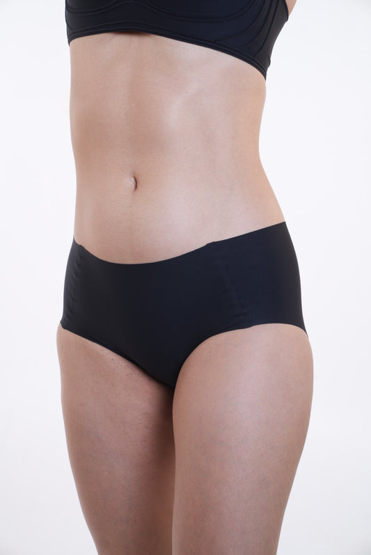 Your go to essential: LayBareShop's BareFit mid-waist panty with soft stretch fabric, cotton gusset, gentle shaping and no visible lines—designed for daily comfort.