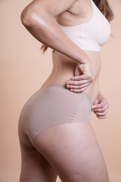 Upgrade your basics with LayBareShop Elevess—mid-waist, light shaping panty with mesh detail, cotton gusset, and a smooth, invisible finish for everyday confidence.